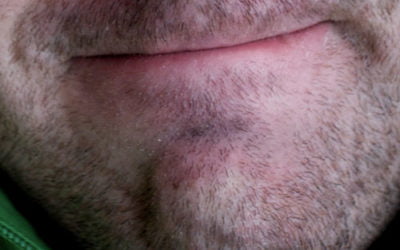 Slowly, she stroked his face. “Sorry for the stubble”, he said.