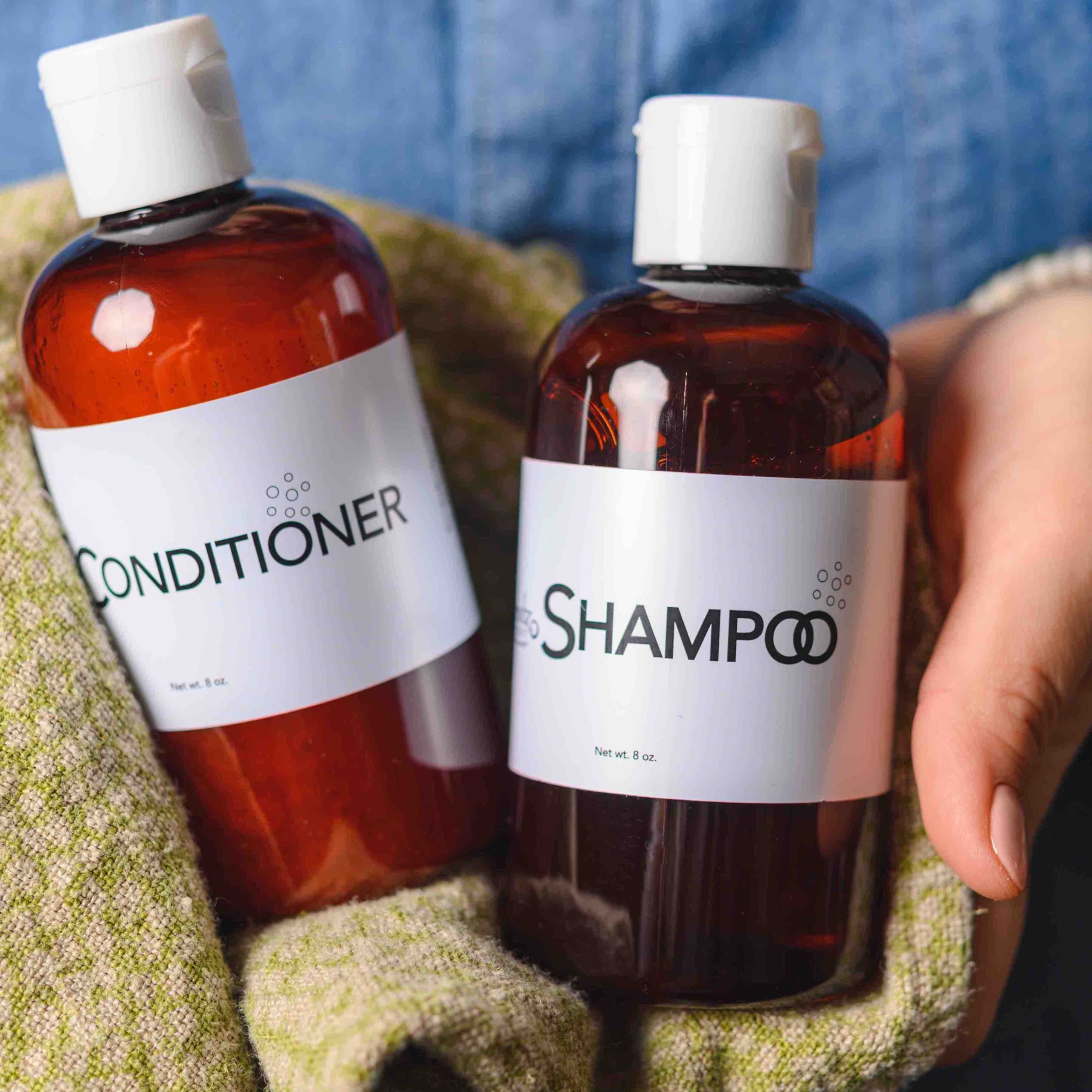 Shampoo and Conditioner in hands